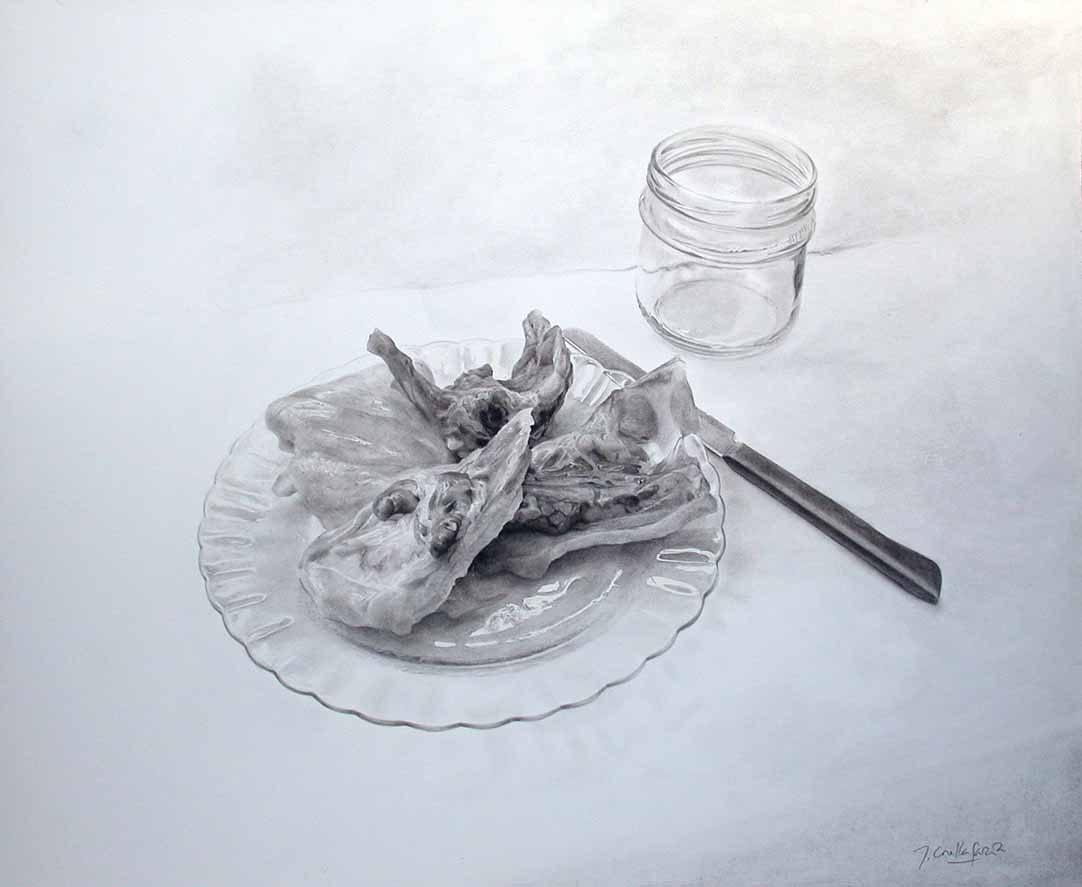 Pollo sobre plato title=